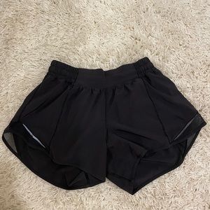 Lululemon black 4" hotty hot shorts